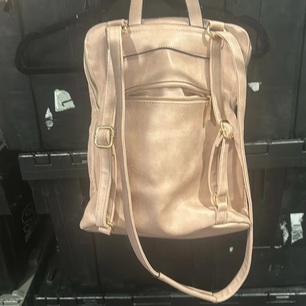 Blush perforated backpack